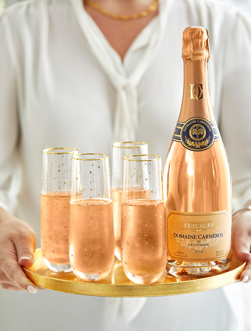 Sparkling wine and candle