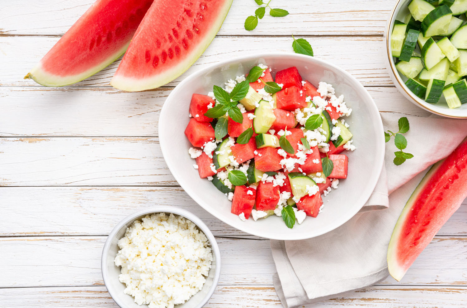Bowl of watermelon salad with feta, mint, and lime