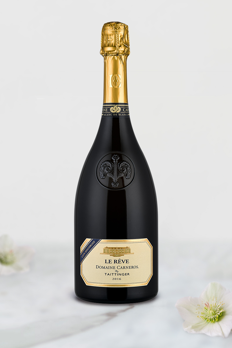 Bottle of 2016 Late Disgorged Le Reve on marble background