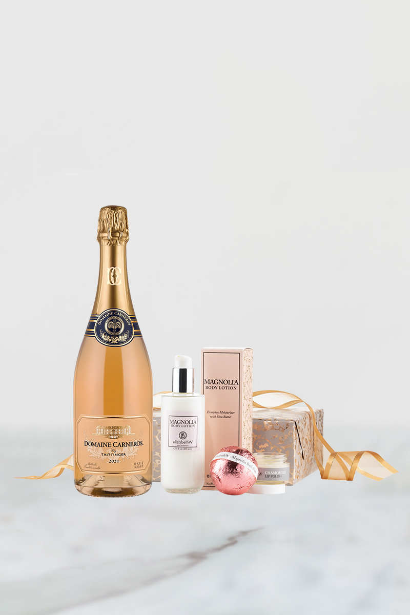 elizabethW spa products with 2021 Brut Rose on marble