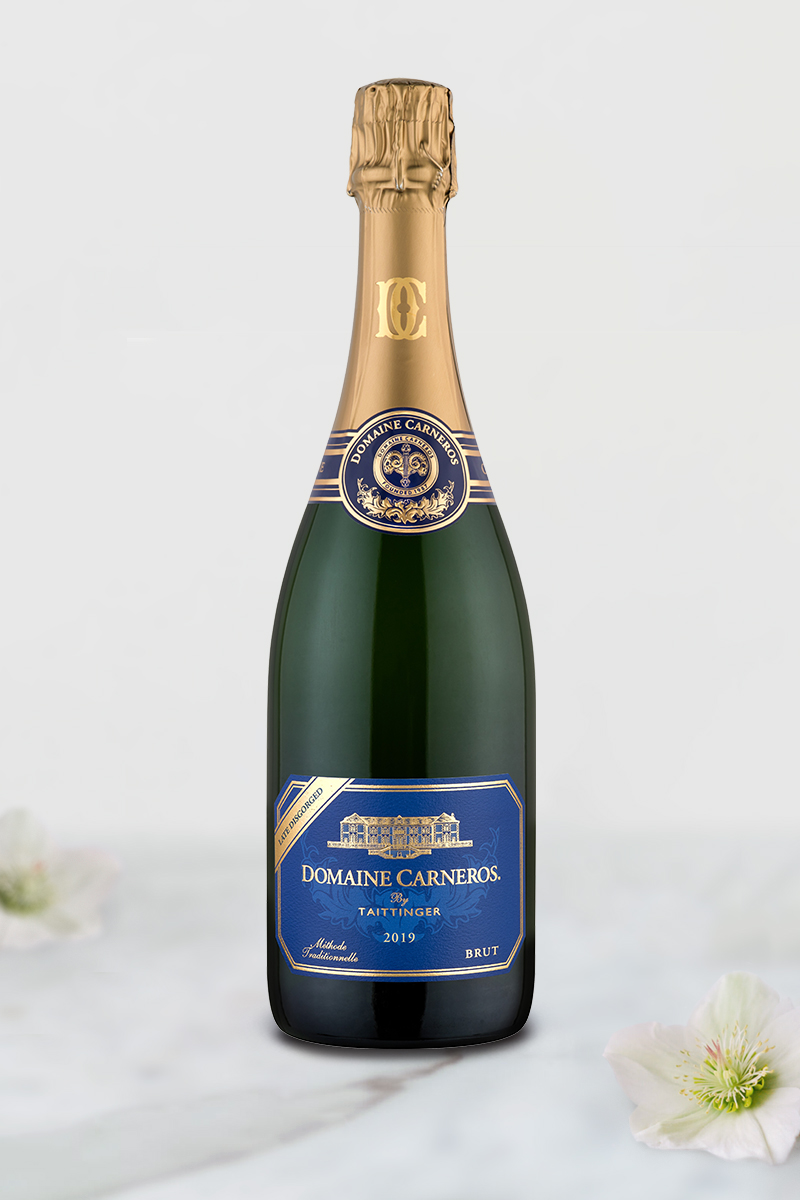Bottle of 2019 Late Disgorged Brut on marble