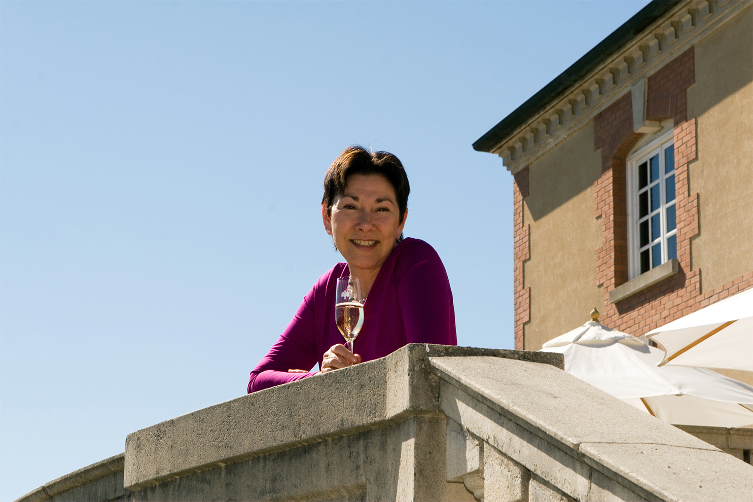 Eileen Crane on front steps of Chateau Terrace