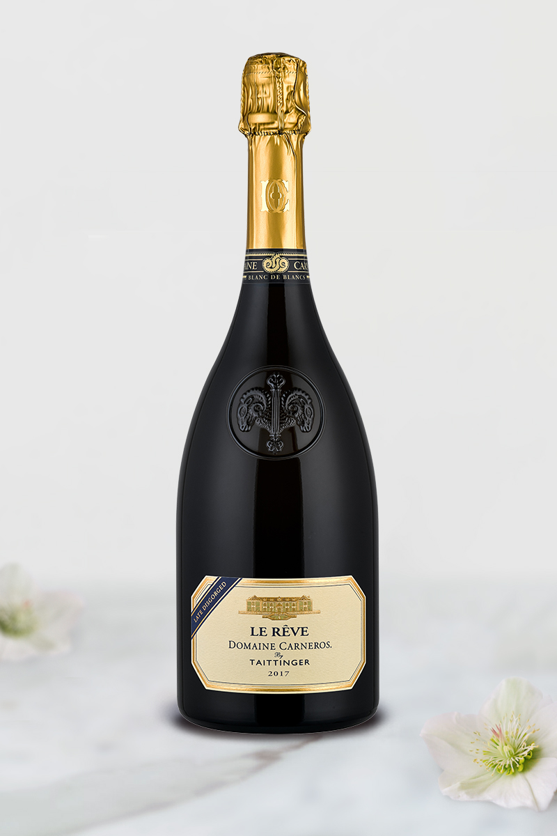 Bottle of 2017 Late Disgorged Le Reve on marble