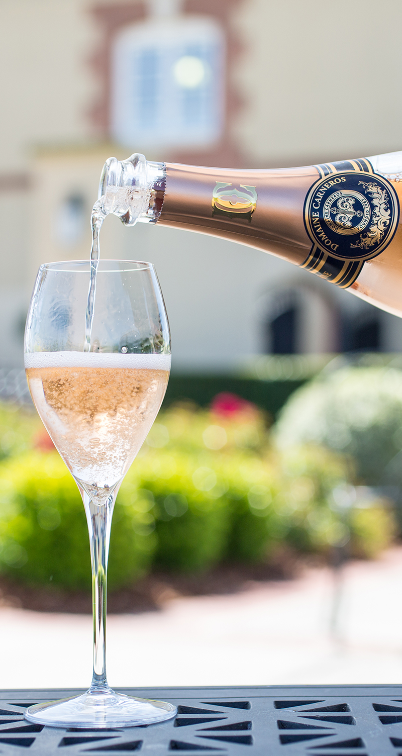 Pouring Sparkling Rose bottle and glass