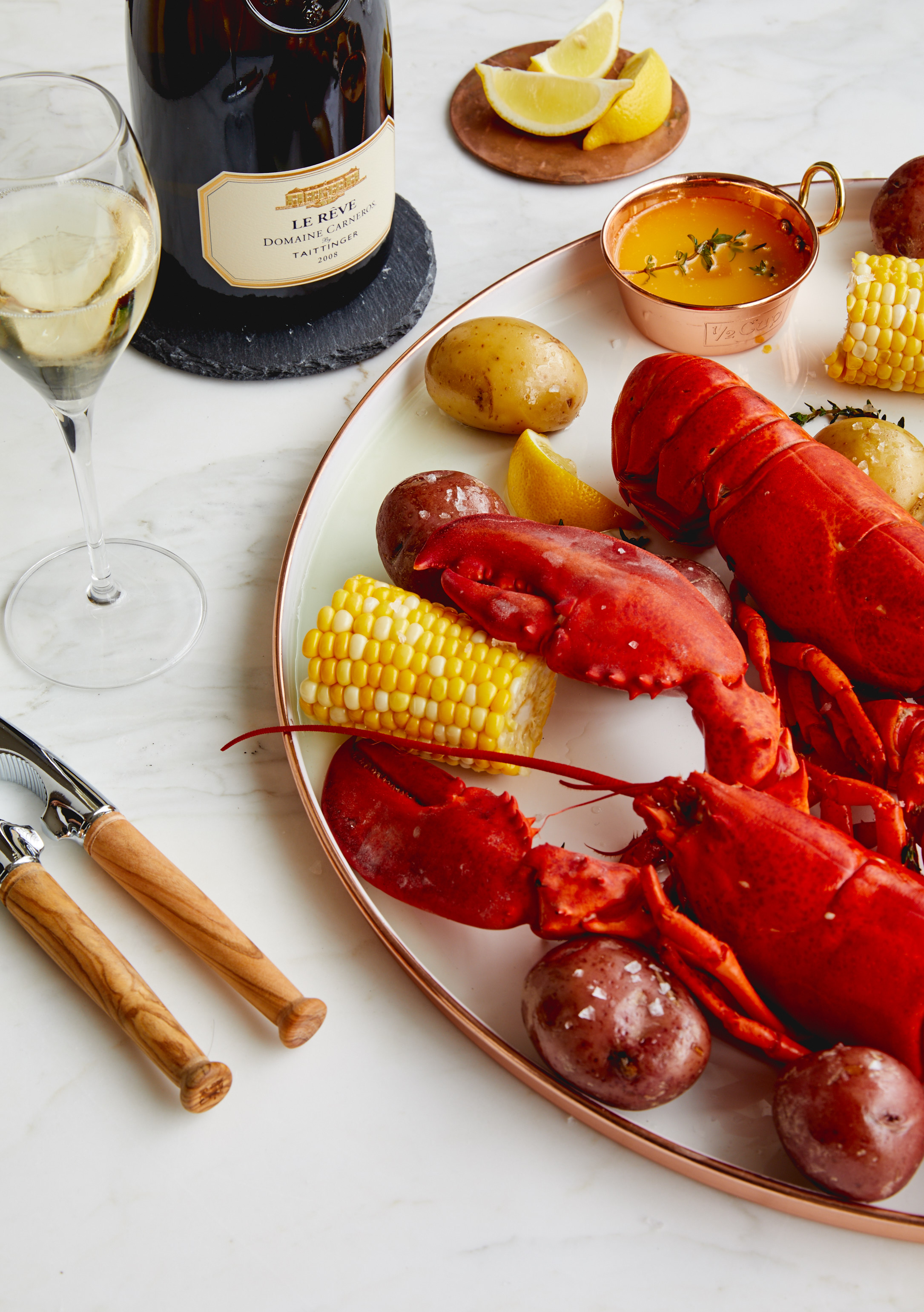 Set the table with lobster and Le Reve